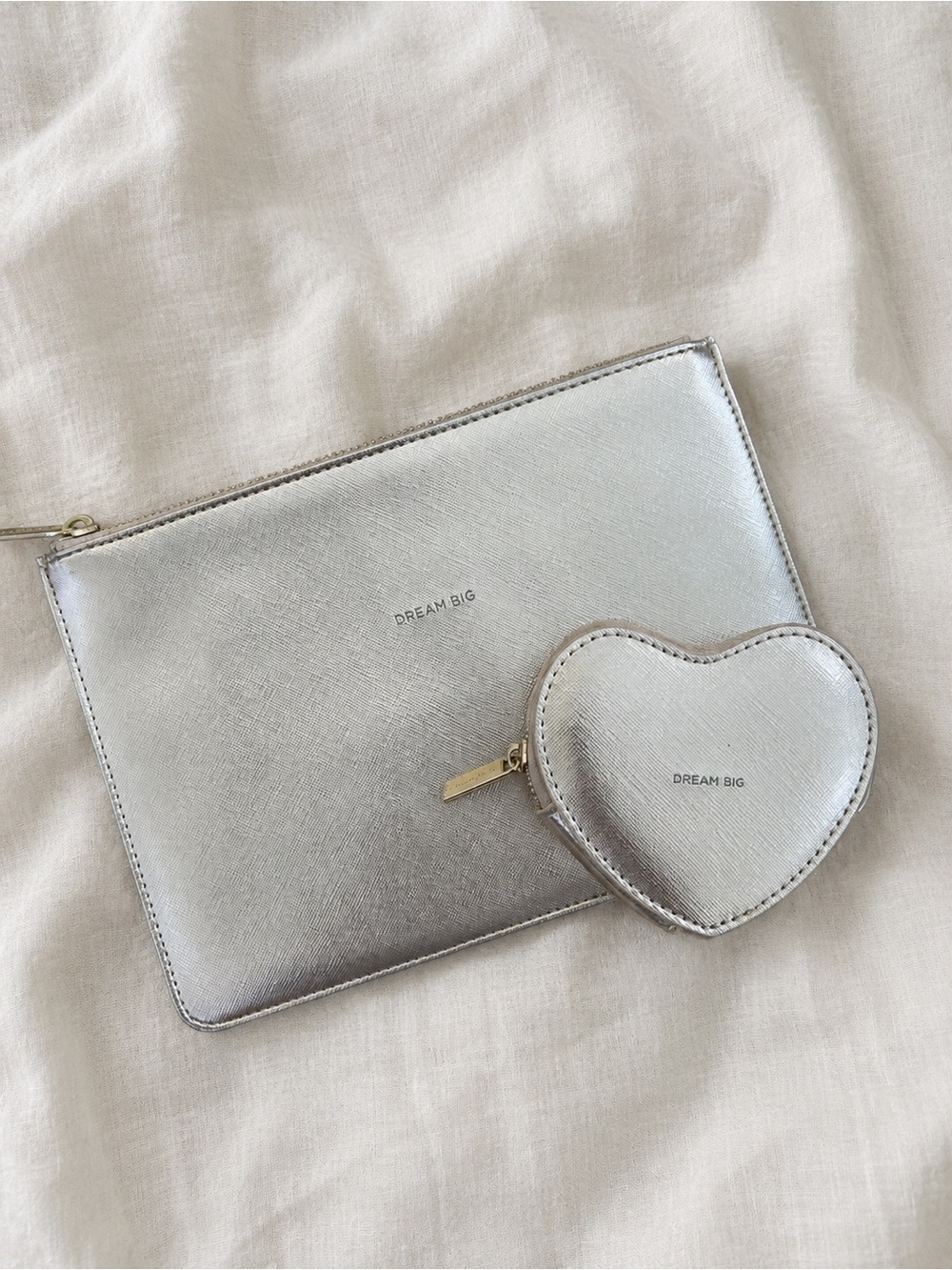 Cutest set of little pouches by Estella Bartlett. Metallic champagne/silver